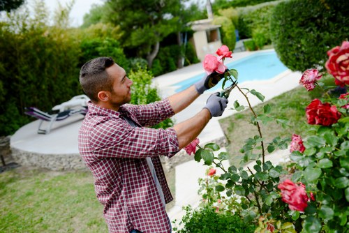 Gardeners working on a Monken Hadley garden in spring
