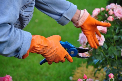 Staff training and safety procedures for gardeners in Monken Hadley